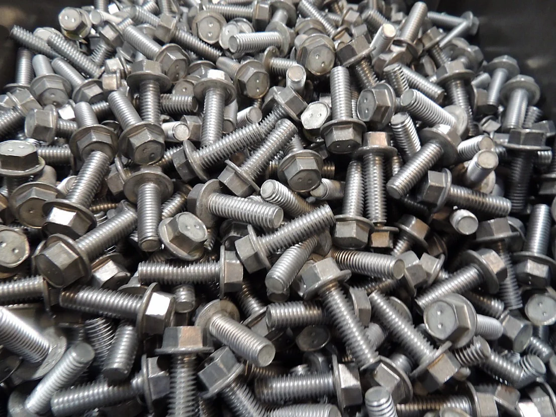 A bin of hex washer-head bolts